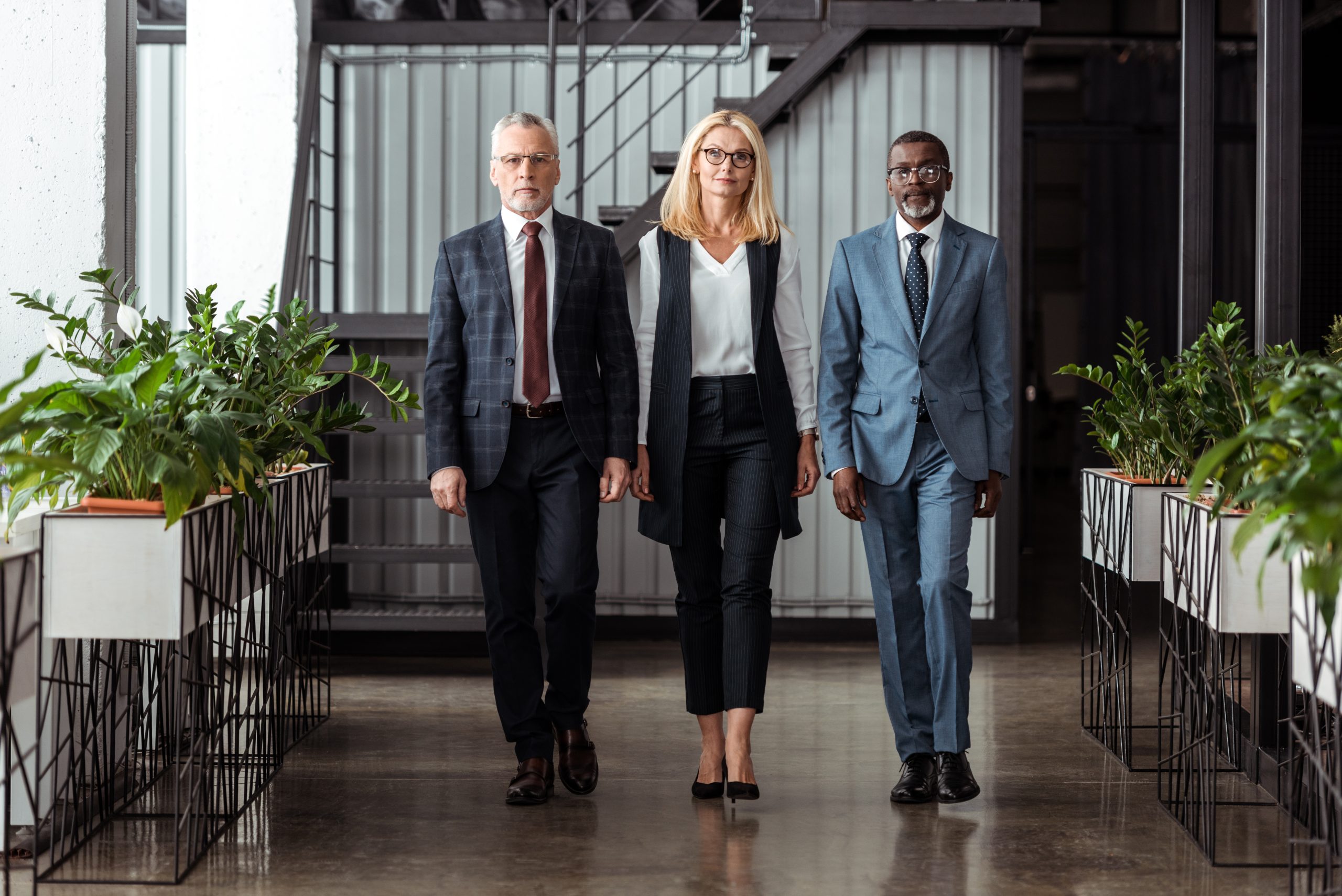 confident blonde businesswoman walking with handso 2023 11 27 05 35 59 utc scaled